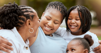 a family hugging and smiling (1)-1-1