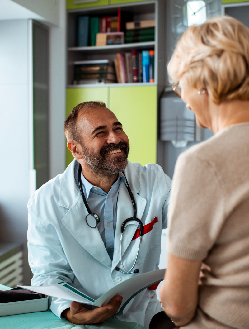 smiling male doctor holding a tablet (2)