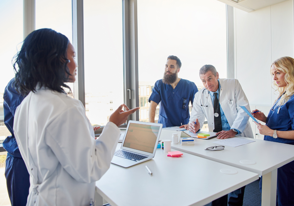 a team of doctors discussing in a conference room