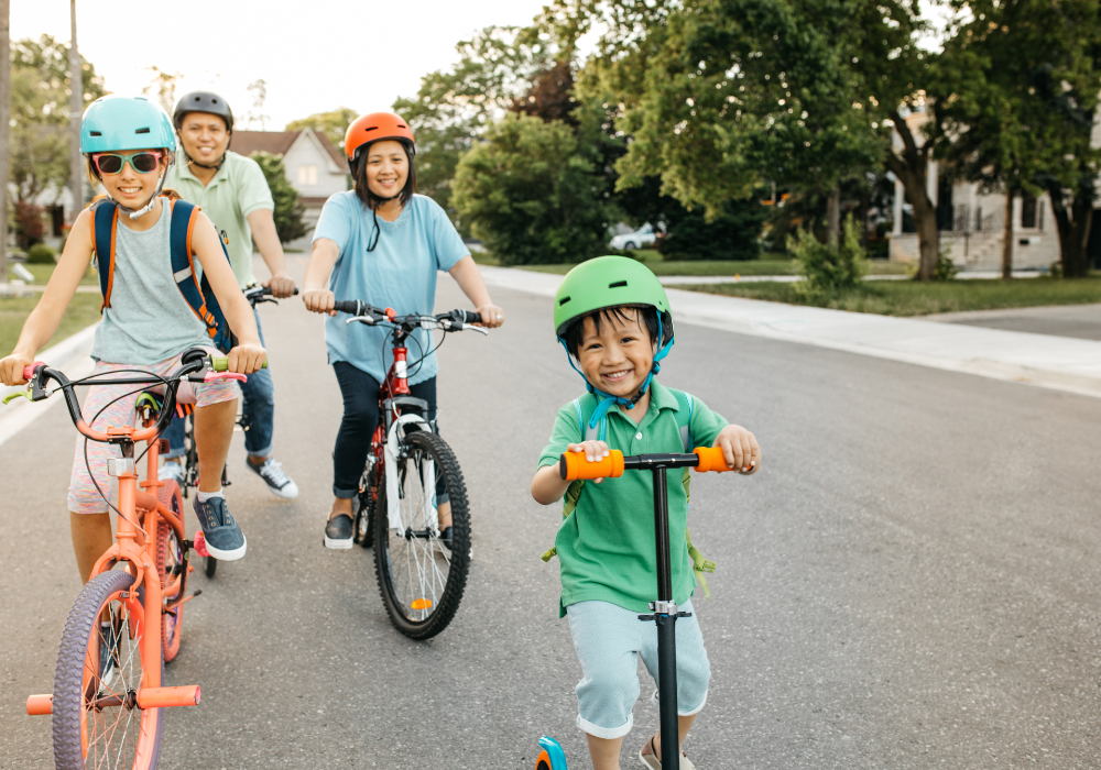 asian family riding bikes