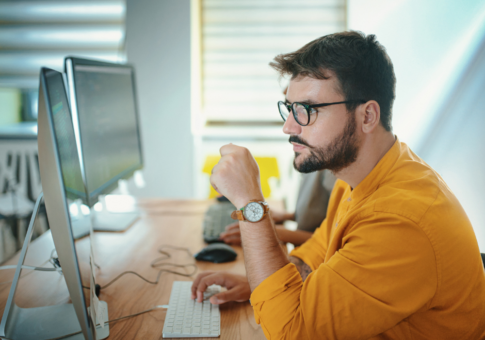 developer looking at computer monitor