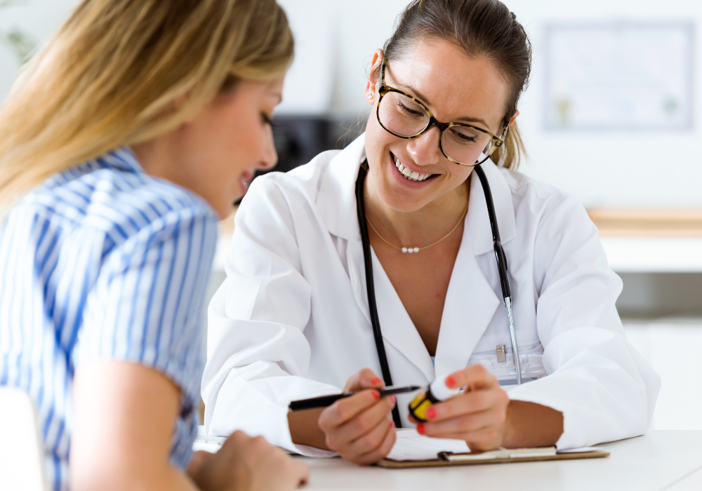 doctor laughing with patient 