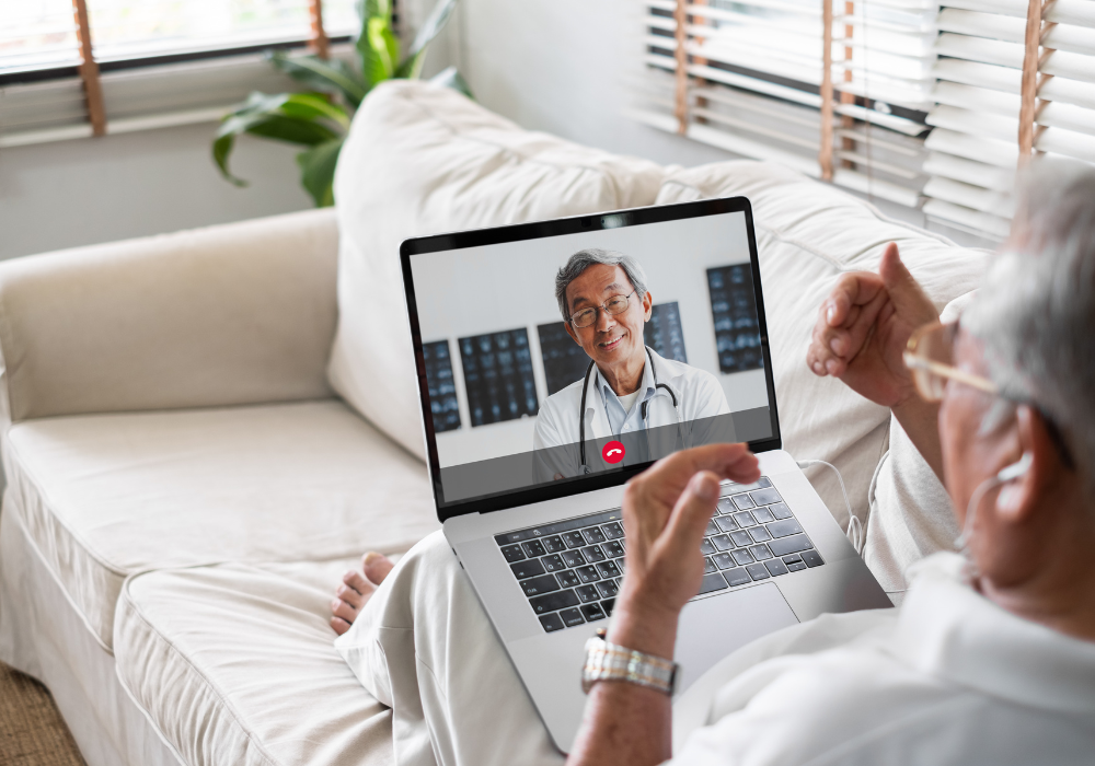 asian female doctor having a virtual call with a patient