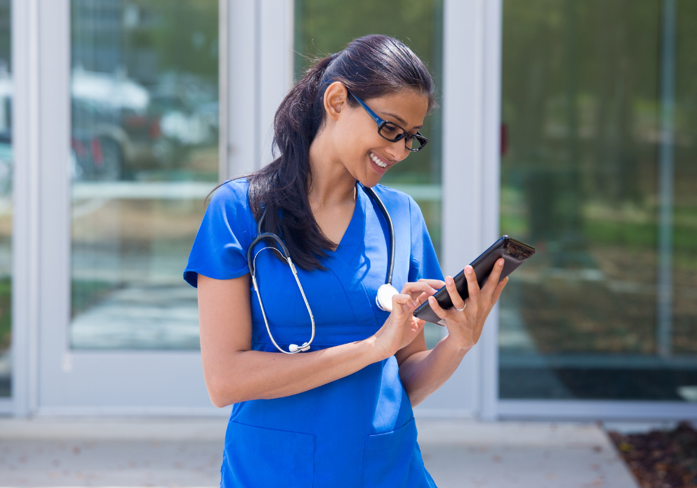 healthcare employee on tablet