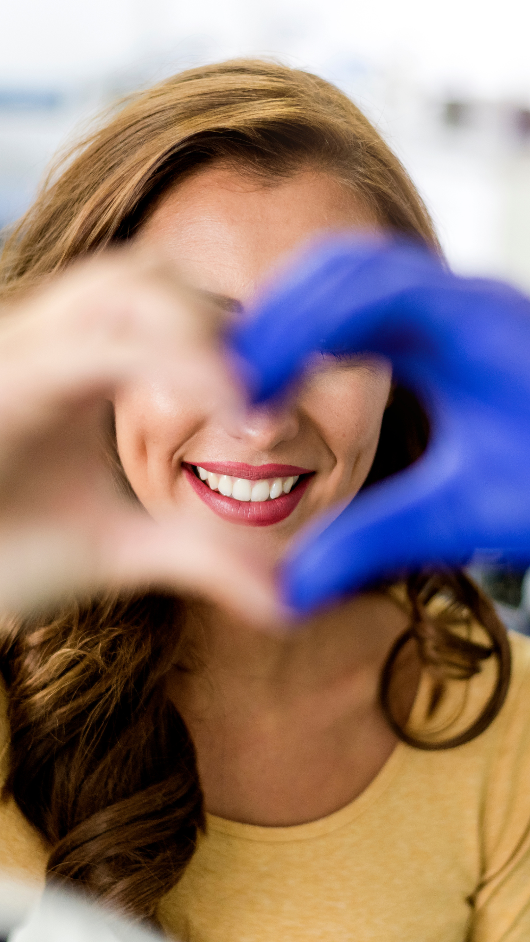 two hands making a heart